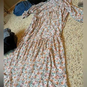 Light pink flower, printed kimono with ruffle pleats throughout it. Size M/L